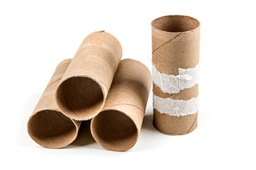 Several empty toilet paper rolls isolated on a white background