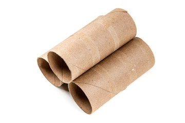 Several empty toilet paper rolls isolated on a white background
