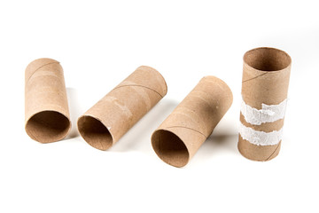 Several empty toilet paper rolls isolated on a white background