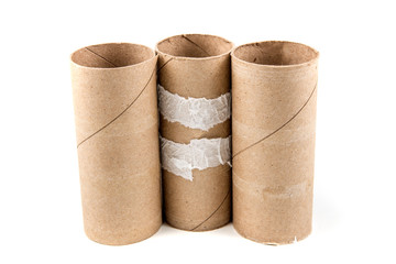 Several empty toilet paper rolls isolated on a white background