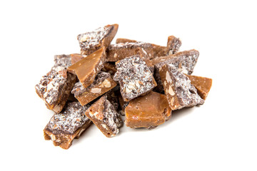 Homemade almond roca isolated on a white background