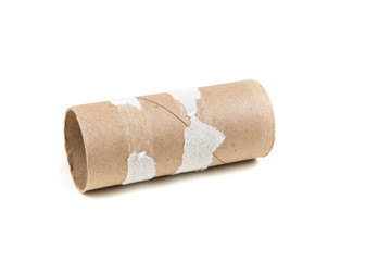 Single empty toilet paper roll isolated on a white background
