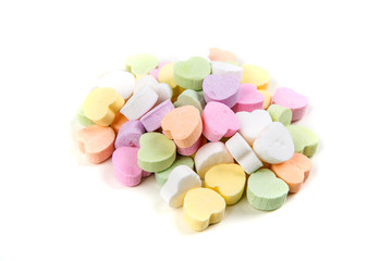 Blank valentine candy hearts isolated on a white background