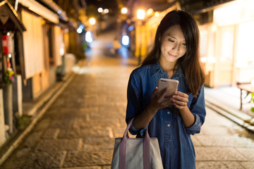 Woman using smart phone