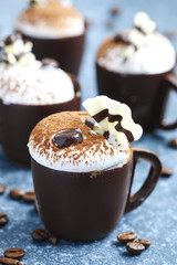 Coffee mousse with whipped cream in chocolate cup