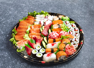 Sushi Set. Different sashimi, sushi and rolls