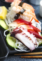 Sushi Set. Different sashimi, sushi and rolls