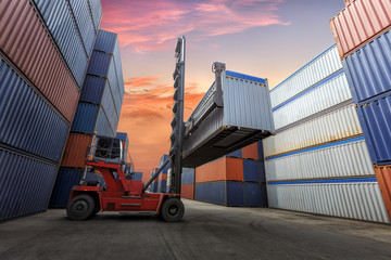 forklift handling the container at dockyard