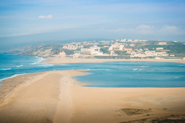 Panoramic view of the lagoon of Obidos, the city of Foz do Arelno and the Atlantic Ocean. Portugal
