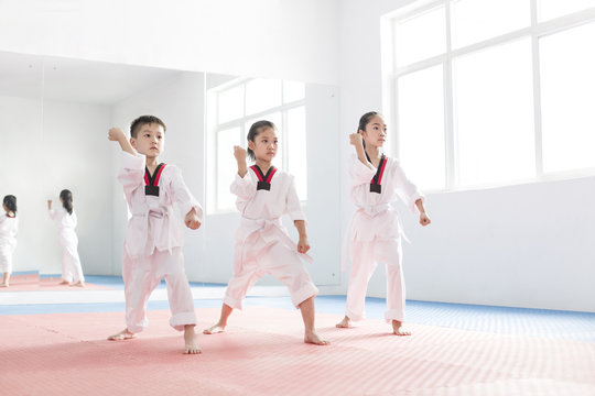 Little children practicing Tae Kwon Do
