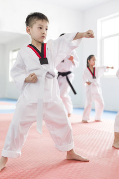 Little children practicing Tae Kwon Do