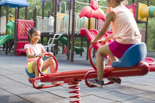 Happy children playing in park