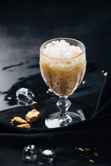 ice coffee in black table