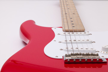 Detail of a red electric guitar