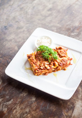 Meat Lasagna.Large white plate