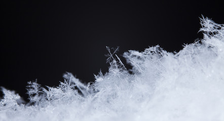 natural snowflakes, photo real snowflakes during a snowfall, under natural conditions at low temperature