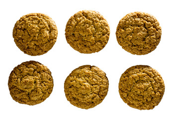 Top view of several oatmeal cookies isolated on white background.