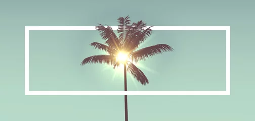 Poster Tropisch palmboomsilhouet tegen zonlicht. Met wit frame © ink drop