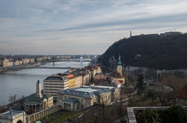 Panoramic view of Gellert Hill at cold foggy day. Budapest. Hung