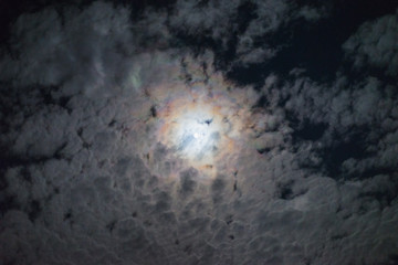 Night full moon bright clouds halo effect cloud sky mystery spooky lunar atmosphere