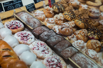 Modern bakery with assortment of bread, cakes and buns
