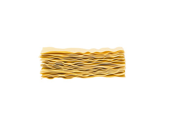 Uncooked lasagna pasta isolated on white background