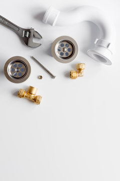 concept plumbing work top view on white background