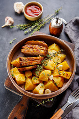 Pork baked in the oven with potatoes
