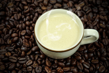 Hot coffee in the coffee beans.