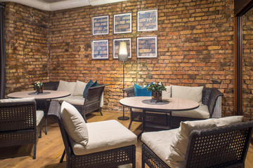 Interior of restaurant.  Brick wall. Modern design.