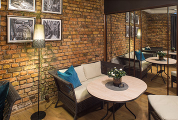 Interior of restaurant.  Brick wall. Modern design.