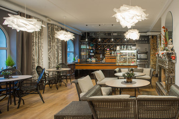 Fototapeta na wymiar Interior of caffe restaurant. Modern design.