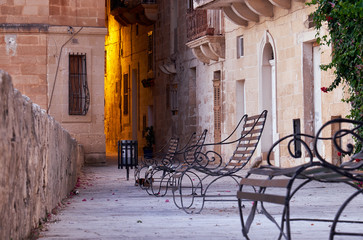 The openwork metal benches on the waterfront of the Senglea, Mal