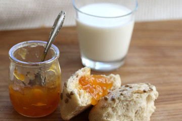 bun with homemade jam and milk, food rural, rustic breakfast, homemade food.