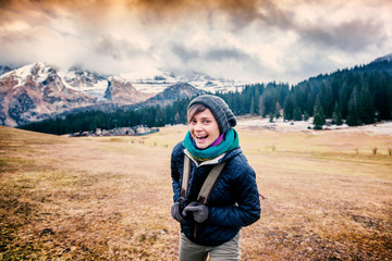 Naklejka premium Happy traveler woman laughing with joy on the background of the