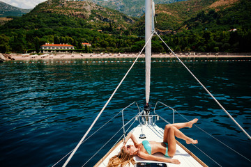 sexy woman relax on yacht in sea