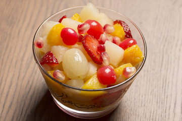 fresh fruit salad on grass background