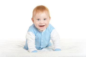Naklejka premium Adorable baby boy on blanket