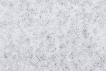 Snow texture or winter white background with pattern of snowflake.