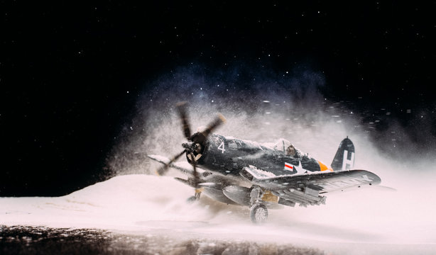 World war II military aircraft with heavy snowfall