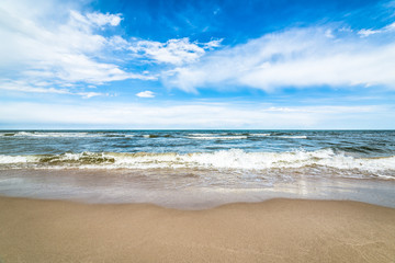 Blue sky and sea beach, landscape, coast with waves in the summer vacation, Poland, Baltic - obrazy, fototapety, plakaty