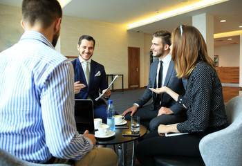 Young professionals work in modern office.Business crew working with startup.