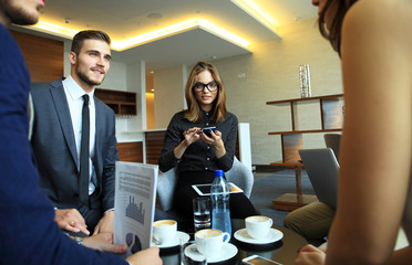 Young professionals work in modern office.Business crew working with startup.