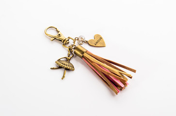 Fashionable key ring isolated on white, stylish boho jewelry