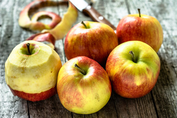 Group of apples on rustic wooden table