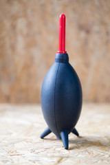 Camera cleaning vacuum pump