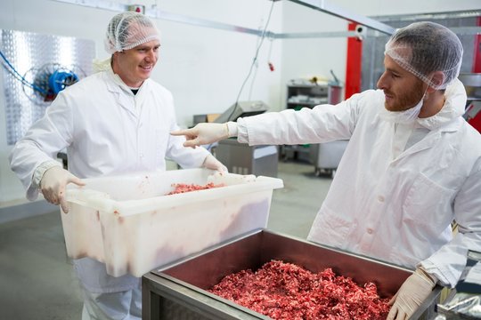 Butchers interacting with each other
