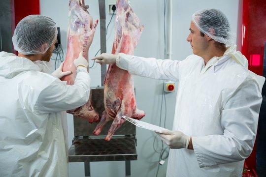 Butchers interacting with each other