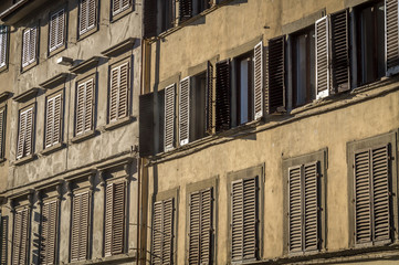 Obraz premium Windows and shutters in a city