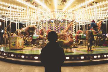  child looking at the carousel © karrastock